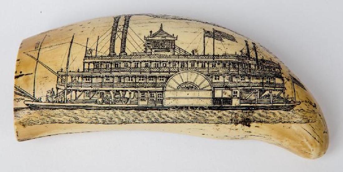 A COMPOSITION DOUBLE-SIDED SCRIMSHAW WHALE TOOTH: Fine double-sided hand engraved composition whale tooth with Civil War era steamboat and plantation scenes, signed 'J.A.' Tooled end and remnants inside. Measures 6 inches.