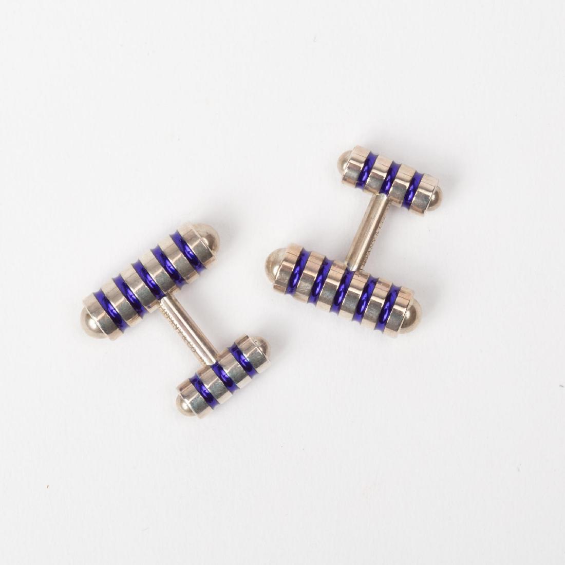 TIFFANY & CO PALOMA PICASSO STERLING CUFFLINKS: PalomaÂ Picasso, Tiffany & Co sterling and blue enamel stripped barrel cufflinks. Each are marked with "PalomaÂ Picasso, Tiffany & Co, 925, Germany". The barrel measures 23.6mm long, and 7.4mm thi