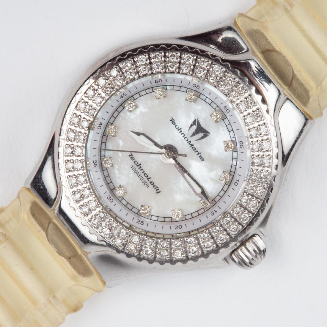 TECHNO MARINE DIAMOND MOTHER OF PEARL WATCH TECHNO LADY: Techno Marine, Techno Lady watch with diamond bezel, diamond hour markers, mother of pearl dial, luminous sword hands and clear TechnoMarine rubber bracelet. The crown screws down and has the TechnoMa