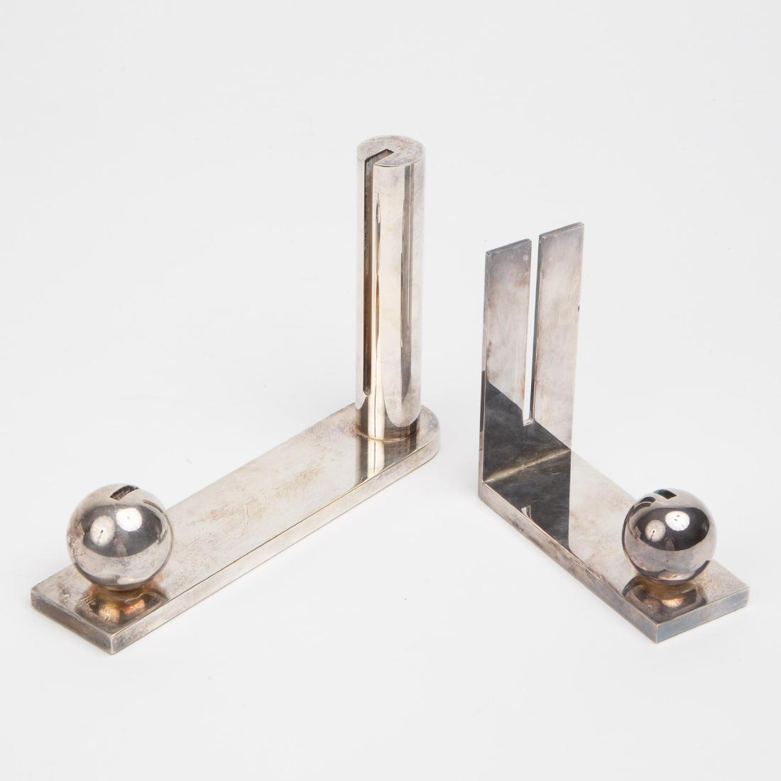 Richard Meier for Swid Powell Pair of Picture Frames: Two Richard Meier designed silver-plated frames manufactured by Swid Powell. Made in Italy. The larger measures 8.75 x 6 inches, and the smaller, 5 x 5 inches.