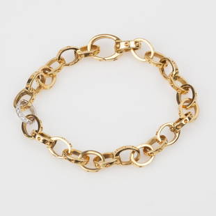 18K Roberto Coin 'Break Away' Pois Moi Diamond Chain: 18k yellow gold Roberto Coin "Break Away" diamond chain bracelet from the Pois Moi collection. Every 4th link is a lobster clasp designed to make the bracelet very customizable. Each link is hand etch