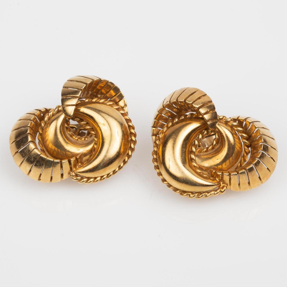 18K Gold Clip-On Crescent Cluster Earrings 24.6dwt: 18K yellow gold clip on earrings, made in Italy. Two solid crescents with rope detail enclosed by two perforated crescents. They measure approximately 34.5mm tall, 28mm wide and are 12mm thi