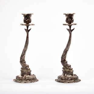 Buccellati Sterling Dauphin Candle Holders, Pair: A pair of sterling silver Dauphin candle holders by Buccellati, 20th century, in the form of Florentine dolphins. Each is stamped "BUCCELLATI ITALY STERLING" and incised "1891" to the