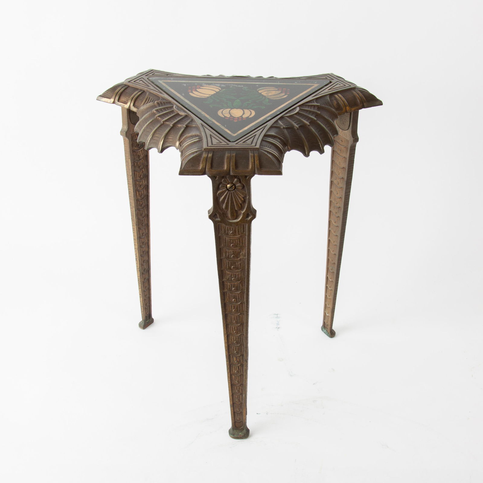 Verona Cast Metal End Table with Decorative Glass Top: A low cast metal table, first half 20th century, marked "VERONA 649 PAT. PEND." to the underside. Inset glass top with reverse painted gold-foil decoration. Measures 19" high and 15 1/2" across.
