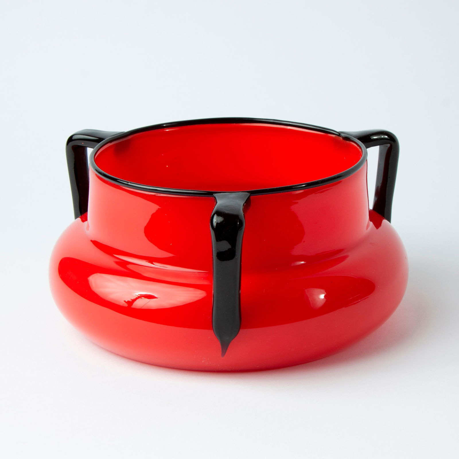 Loetz Tango Large Handled Art Glass Bowl: A large example of Loetz Tango (Czechoslovakia) art glass from Michael Powolny's designs of handled forms, circa 1915-1920. Red and black glass handled bowl, unmarked, measuring 9 7/8" acros