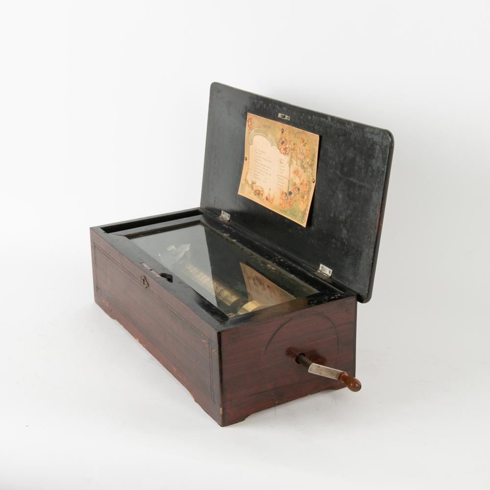 Mermod Freres 1888 Swiss 10-Tune Cylinder Music Box: A late 19th century Jacot's (Mermod Freres) Swiss cylinder music box, in mahogany case, featuring a 10 song program, numbered 78361. Original lithographic tune card (printer F. Champenois Paris)&