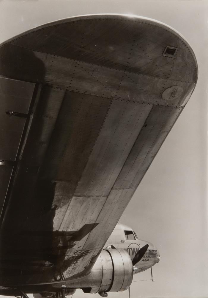Margaret Bourke-White Silver Gelatin, TWA Plane Wing: Margaret Bourke-White American, 1904-1971 Untitled TWA photograph, circa 1935 Silver gelatin print 10" x 7 1/4" Pioneering photojournalist and industrial photographer Margaret Bourke-White was hired i