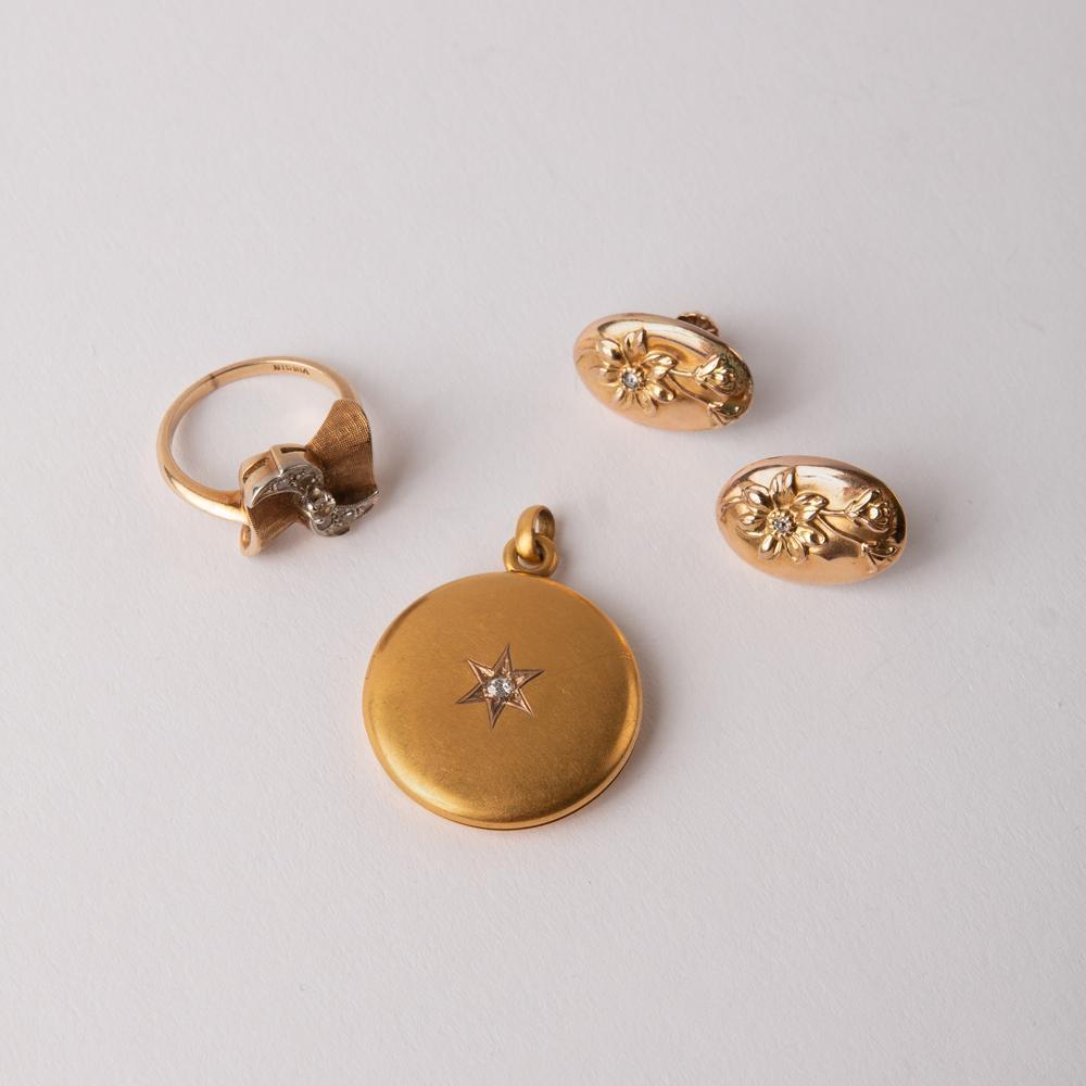 Group of 3 Gold Diamond Jewelry Items: Group of three gold and diamond jewelry items including a 14K yellow and white gold bow ring, a pair of 10K yellow gold diamond earrings, and a 10K diamond locket. The 14K bow ring has five round diam