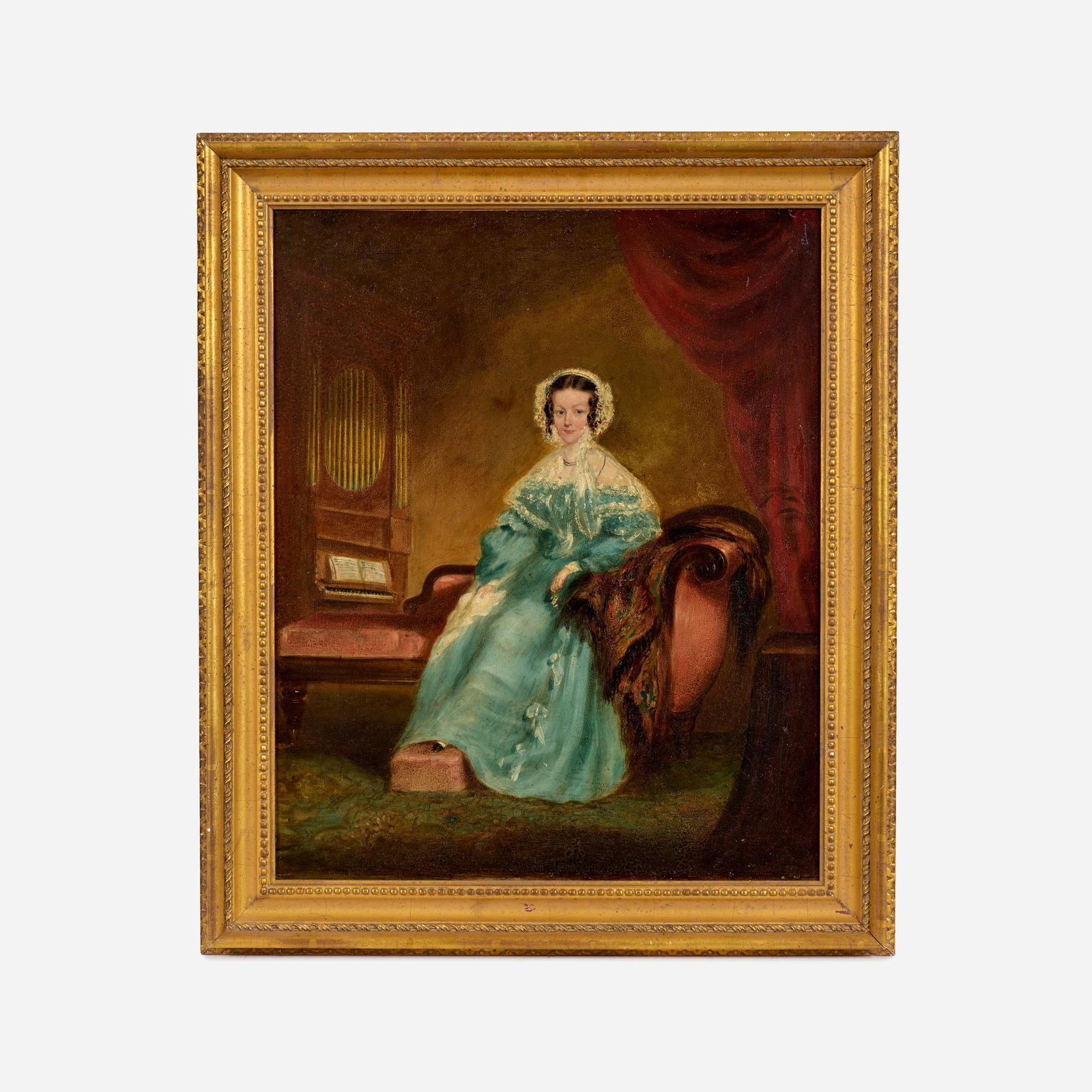 Oil Portrait of a Woman by an Organ, English 19th c.: A good 19th c. English oil portrait on canvas of a woman in a light blue dress, seated on a fainting couch with a pipe organ behind her. Not signed. Measures 22" x 18". Presented in a gilt fra