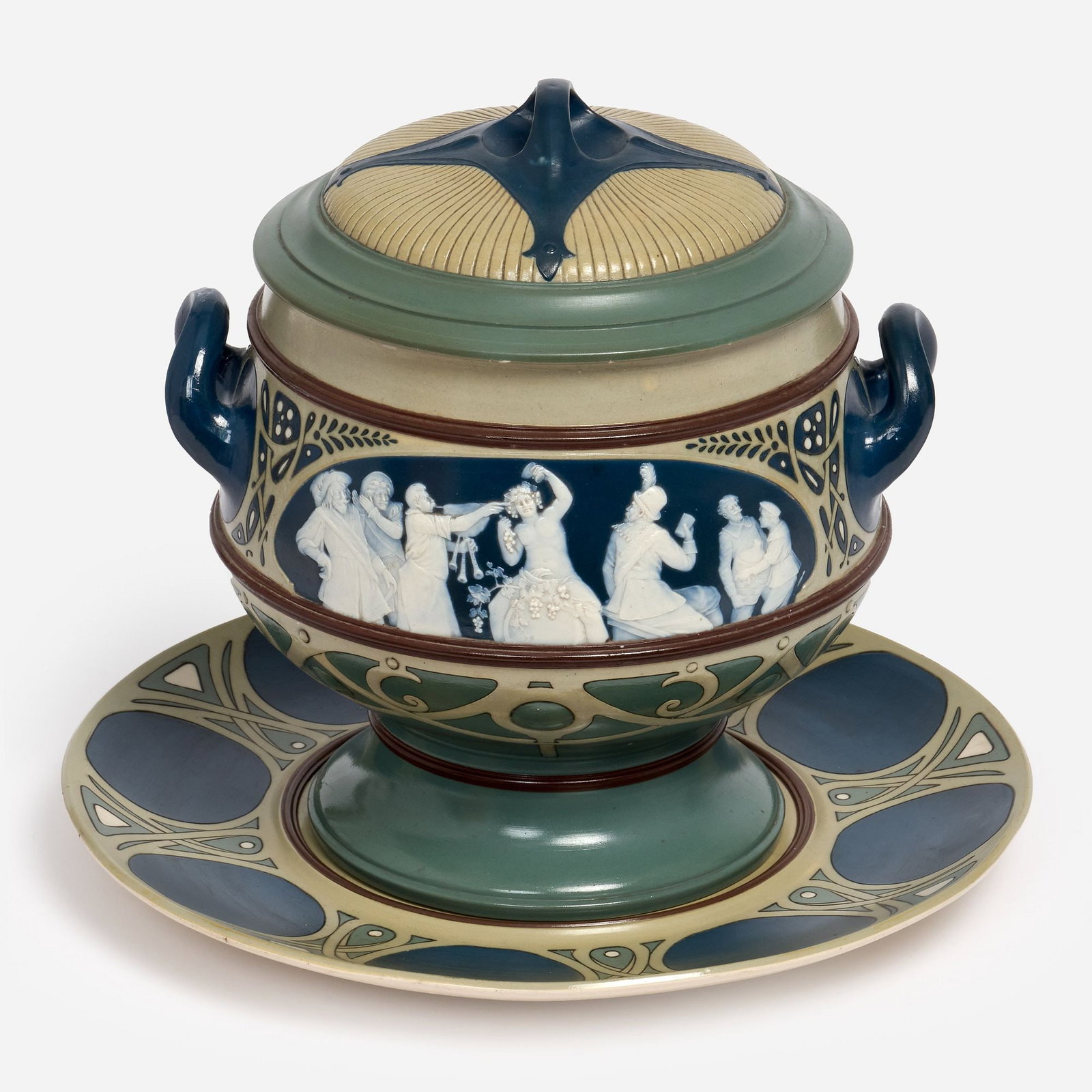 V&B Mettlach Tureen with Underplate (ca. 1904-05): A Villeroy & Boch Mettlach handled pottery tureen and matching underplate, pattern number 2969, with Bacchanalian motif in bas relief. Date codes indicating 1904 (tureen) and 1905 (underplate) pro