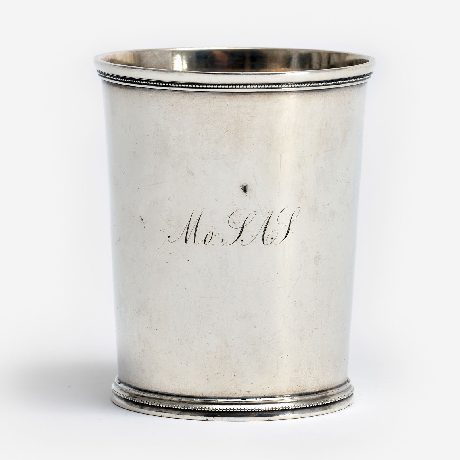 Missouri Silver Julep Cup, George Schoolfield (ca. 1850s, Columbia): An American coin silver mint julep cup, created circa 1850s by silversmith George G. Schoolfield [b. 1824, d. 1868] of Columbia, Missouri. Monogrammed "MoSAS," an award given by the Missouri State Agr