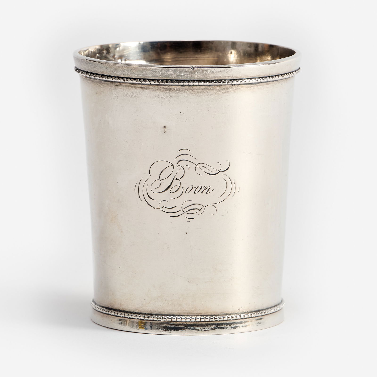 Missouri Silver Julep Cup, Edward Mead (19th c., St. Louis): An American coin silver mint julep cup, created by Edward Mead & Co. of St. Louis, Missouri [active 1843-1880]. Engraved "Boon." Measures 3 1/2" x 3" x 3", and weighs 3.46 ozt.