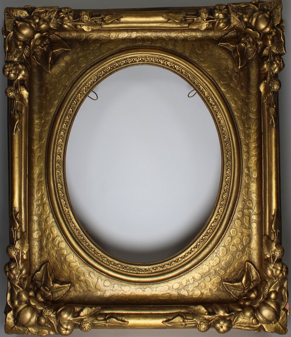 Vintage European School Gilt Oval Frame: Vintage European School Gilt Oval Frame. Made from some form of ceramic. Rabbet size: 9.75 x 8 in. Overall Size: 14.75 x 12.75 in.