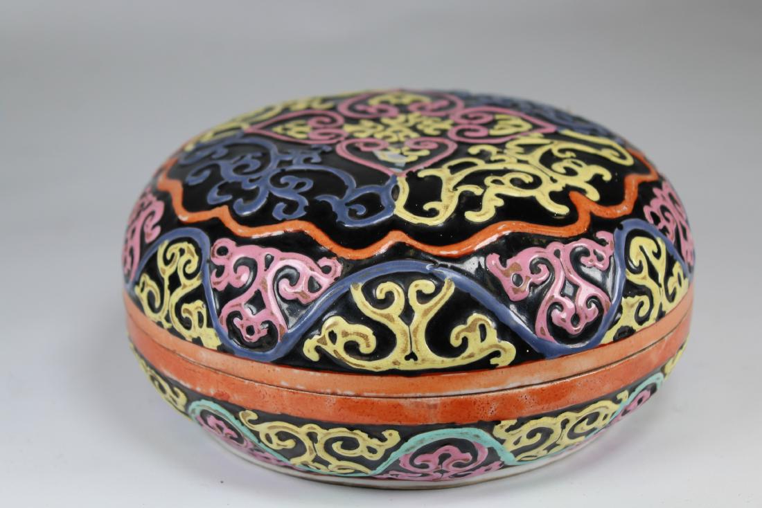 Chinese Black Ground Covered Porcelain Box: Chinese Black Ground Covered Porcelain Box. Diameter: 6.25 inches.
