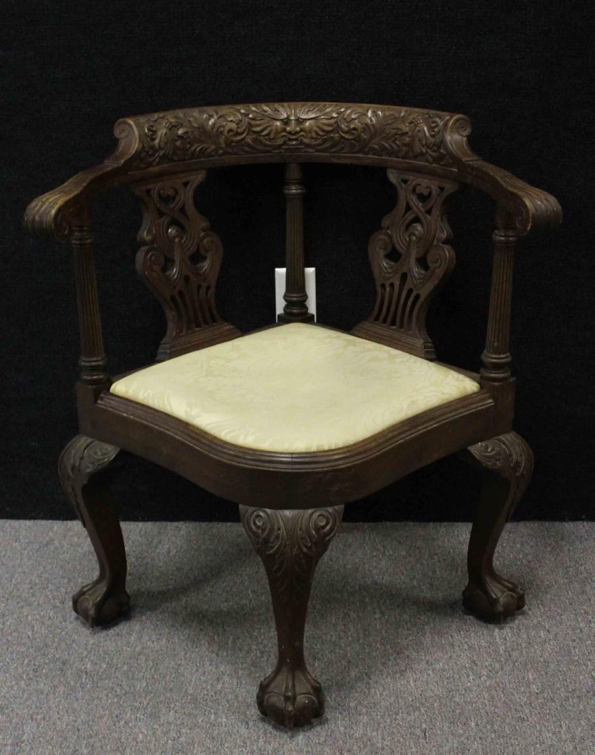 Antique Carved English Corner Chair: Antique Upholstered/Carved English Corner Chair. Ball & Claw Feet. Dimensions: 30.5 x 28.5 x 26 in. Weight: 20 lbs. approx.