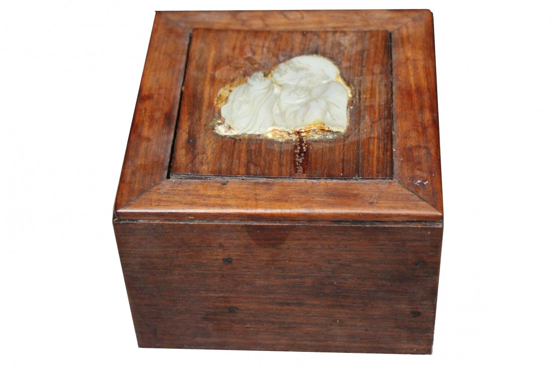 Antique Chinese Wood/Jade Box, Possibly Huanghuali: Antique Chinese Wood/Jade Box, Possibly Huanghuali wood. With carved pale jade figure on top of box. Dimensions: 3.5 x 5.25 x 5.25 inches.