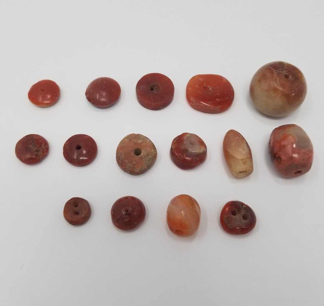 (15) Tairona Carnelian Beads from Colombia: (15) Tairona Carnelian Beads from Colombia ca. 1000 - 1500 AD. Various highly polished types up to 25mm in diameter, many are translucent. (TR188)