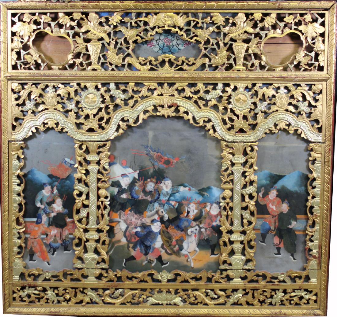 Antique Chinese Reverse Painted Glass Tryptich: Antique Chinese Reverse Painted Glass Triptych housed in an elaborate gilt carved architectural frame. Central portion of triptych having hairline. Marked on back. Overall Size: 35 x 36.5 in.