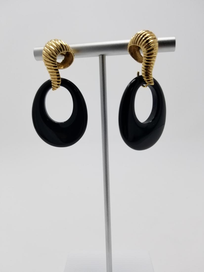 Pair of Black Onyx Earrings: Pair of Black Onyx Earrings Total Weight: 11.6 g. Onyx Sizes: 1.25 x 1 in. - All silver, gold and/or jewelry lots or invoices containing said lots MUST be paid for via WIRE TRANSFER or CASHIER"S CHECK