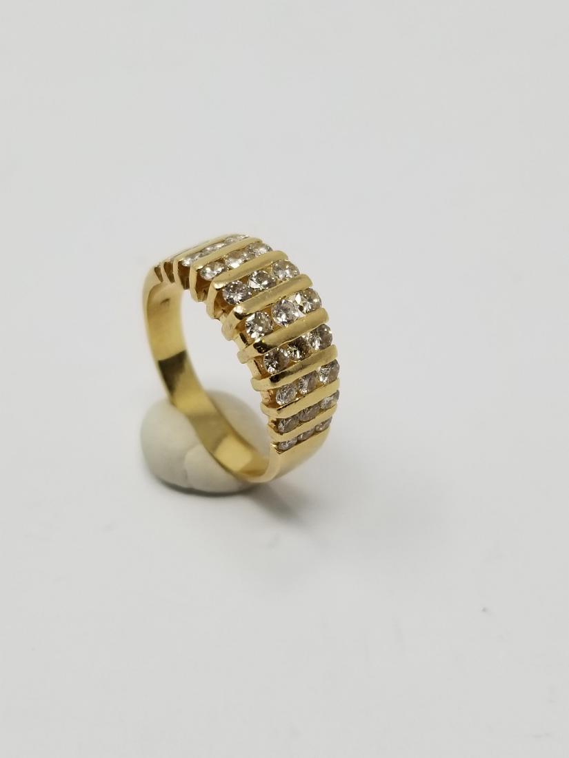 18K Gold & Diamond Ring: 18K Gold & Diamond Ring. This ring has beautiful round cut diamond channeled set in tiered rows. Ring Size: 7.25 Total Weight: 5.1 g Approx Total Diamond Weight: 1ct - All silver, gold and/or jewelry 
