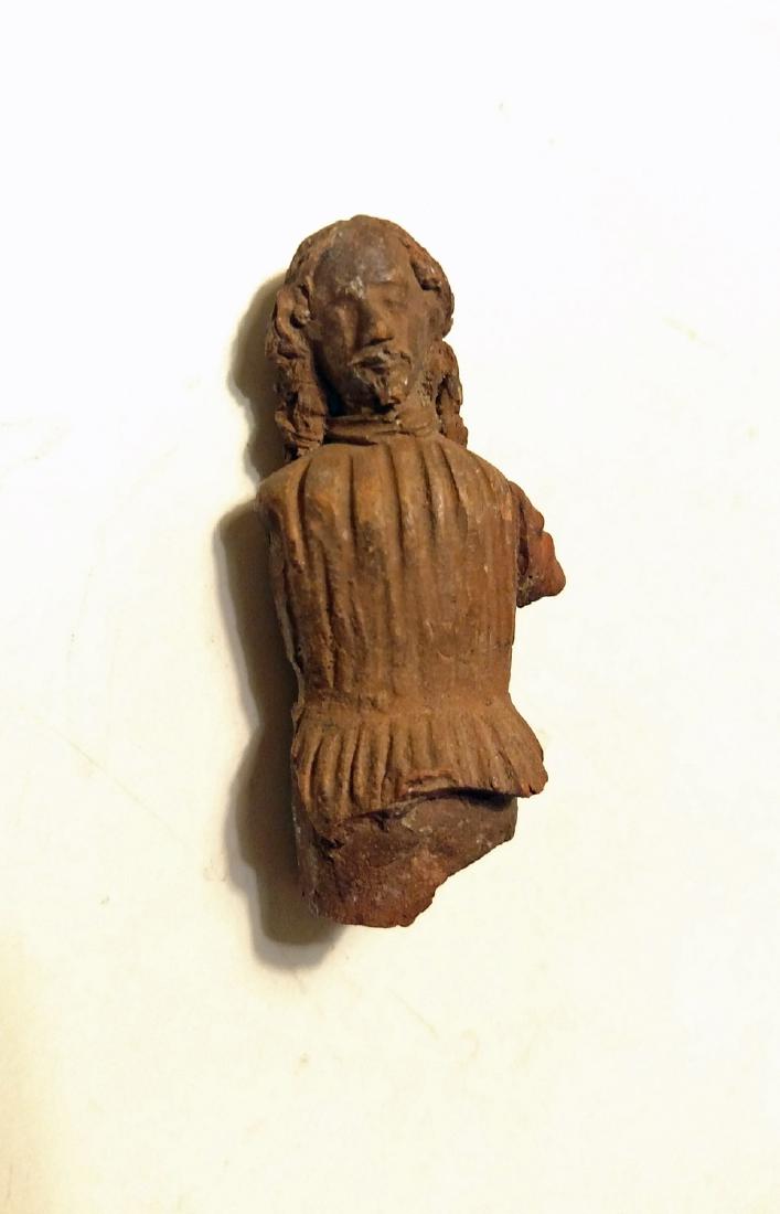 Early Spanish Colonial Fragment of European Figure: Early Spanish Colonial Fragment of bearded European - Oaxaca, Mexico. Found at Mitla ruins, 1894. Moldmade earthenware. Length: 1 7/8 in. In good condition.