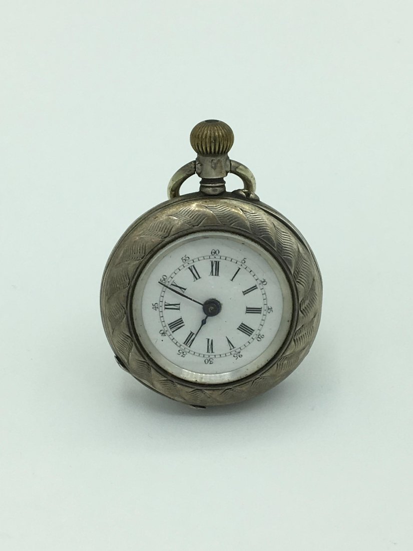 Antique Locle 800 Silver Louis Jacot Ladies: Open Face Pocket Watch Size 2/0s, Roman Numerals, Mechanical: Hand-winding, Beautifully Embossed Case in Good Condition with Normal Age Associated Wear. Not Running.Weight 29.1 grams / 18.7 dwt.
