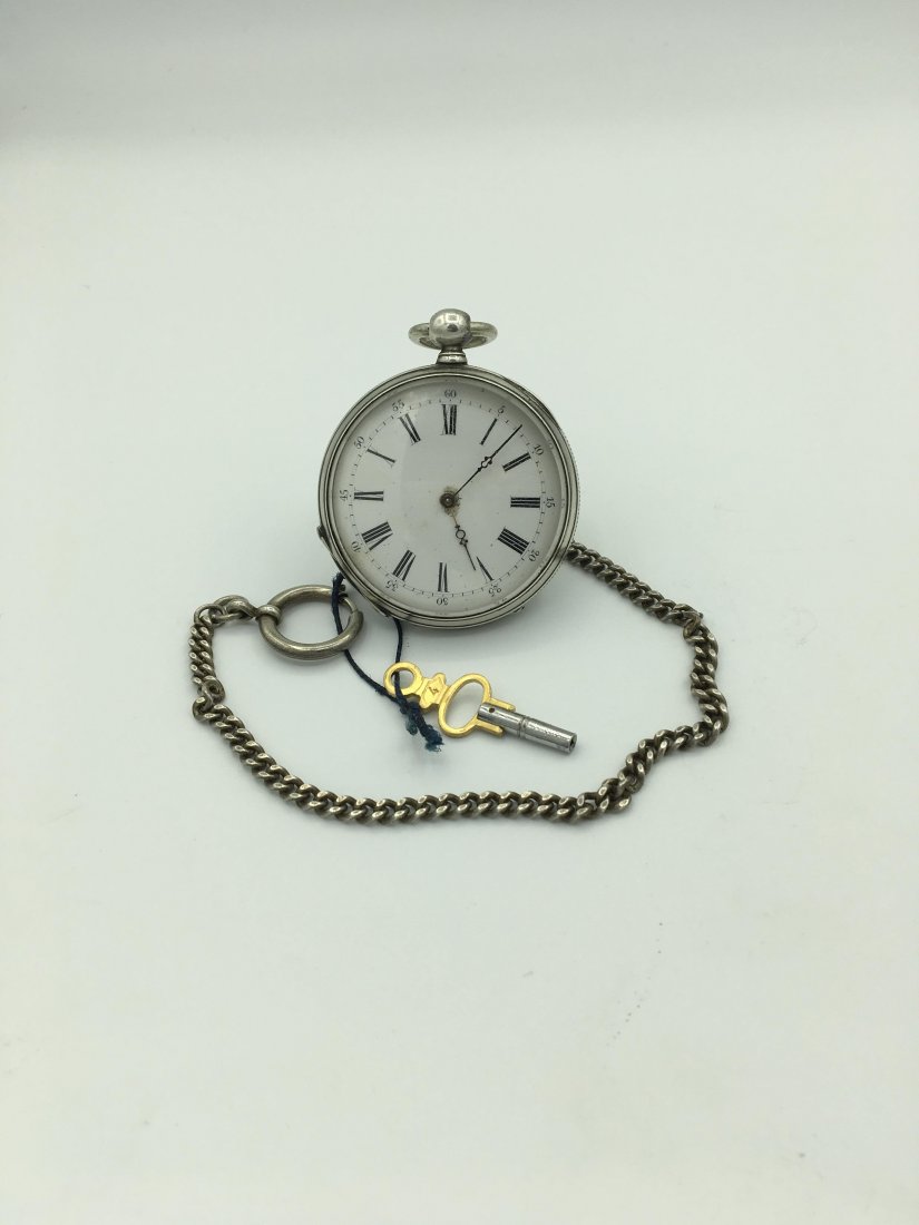 Antique Silver 10 Ruby Girard Geneve Pocket Watch: Echappement a Cylindre Open Face, Size 10s, Roman Numerals, Keywind with Key, 12 Inch Metal Chain, Some Creases to Case Back and Normal Age Associated Wear, Running Working Condition May Need Overhaul