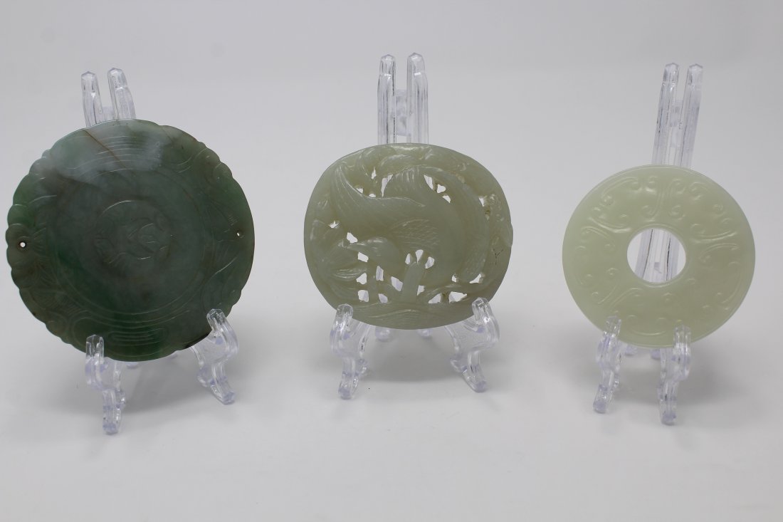 (3) Chinese Carved Jade Discs: (3) Chinese Carved Jade Discs. Largest Diameter: 3 inches.