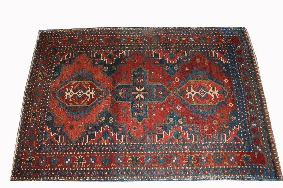 Antique Persian Rug: Antique Persian Rug. Dimensions: 55 x 35 inches.