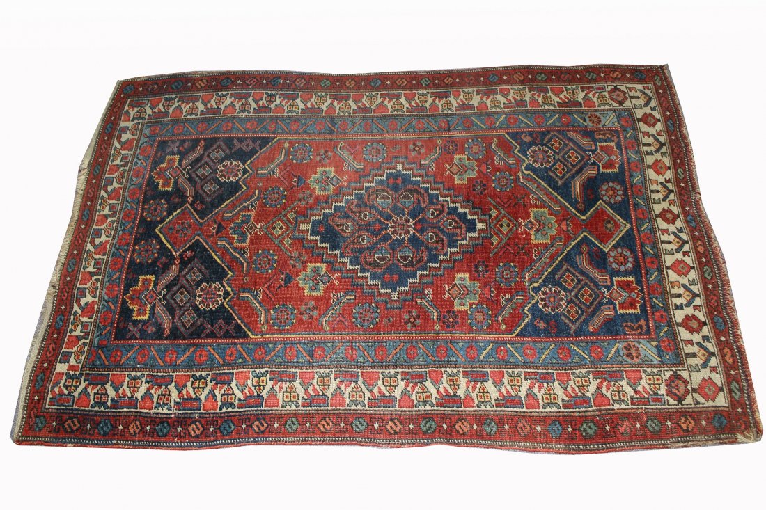 Antique Persian Rug: Antique Persian Rug. Dimensions: 60 x 39 inches.