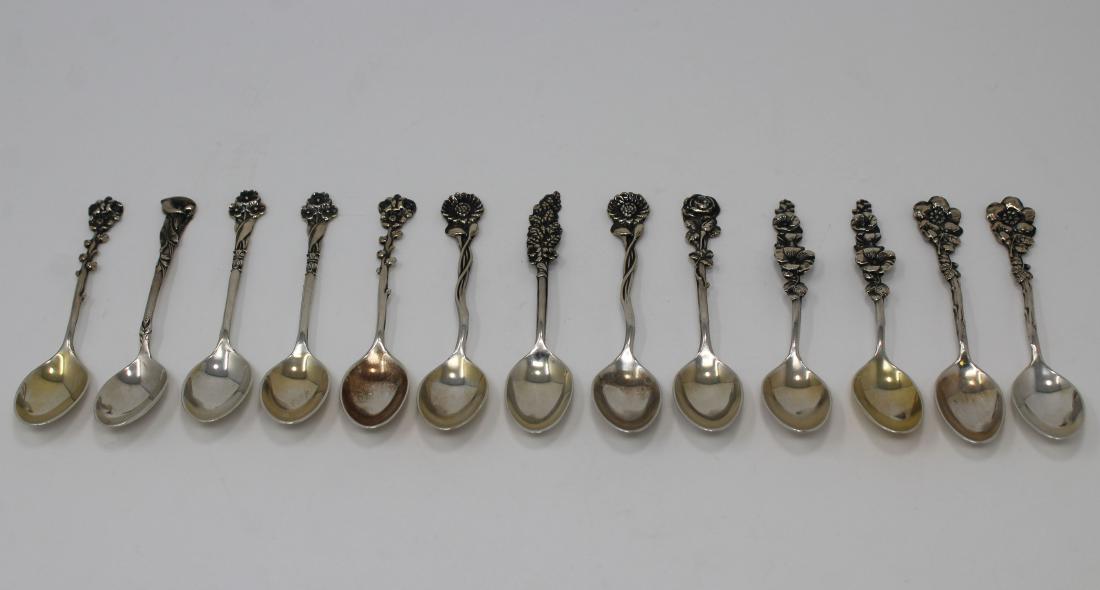 13 Reed & Barton Sterling Silver Demitasse Spoons: (13) Reed and Barton Sterling Silver Demitasse Spoons. Marked on backside. Length: 4 in. Total Weight: 4.53 ozt