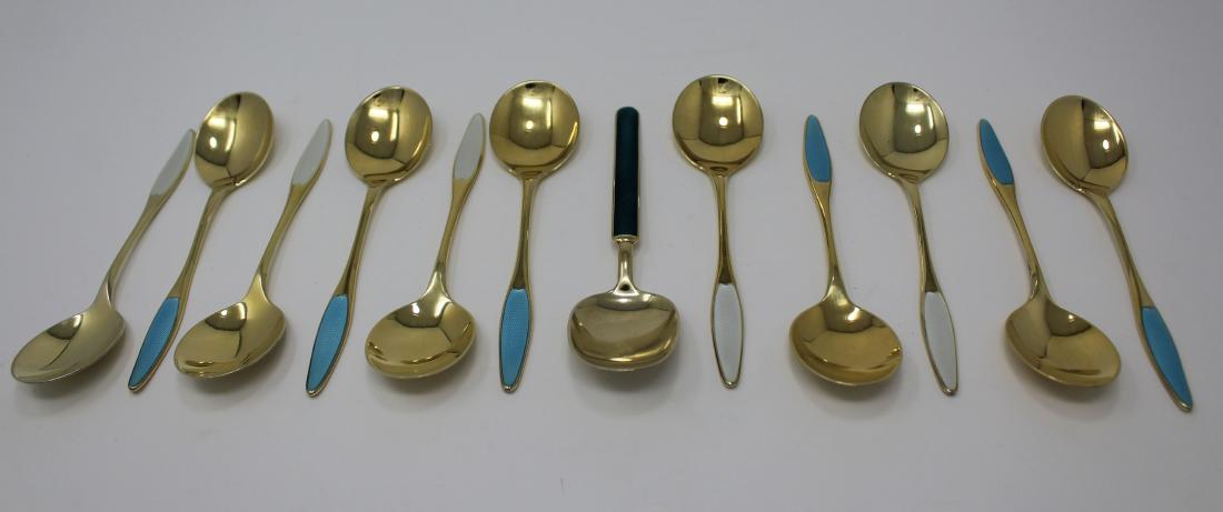(12) Demitasse Norwegian Sterling Enameled Spoons: (12) Demitasse Sterling Enameled Norwegian Spoons. Stamped Sterling and Norway on Spoons. Lengths: 5.5 in. Total Weight: 8.94 ozt - All silver, gold and/or jewelry lots or invoices containing said lot