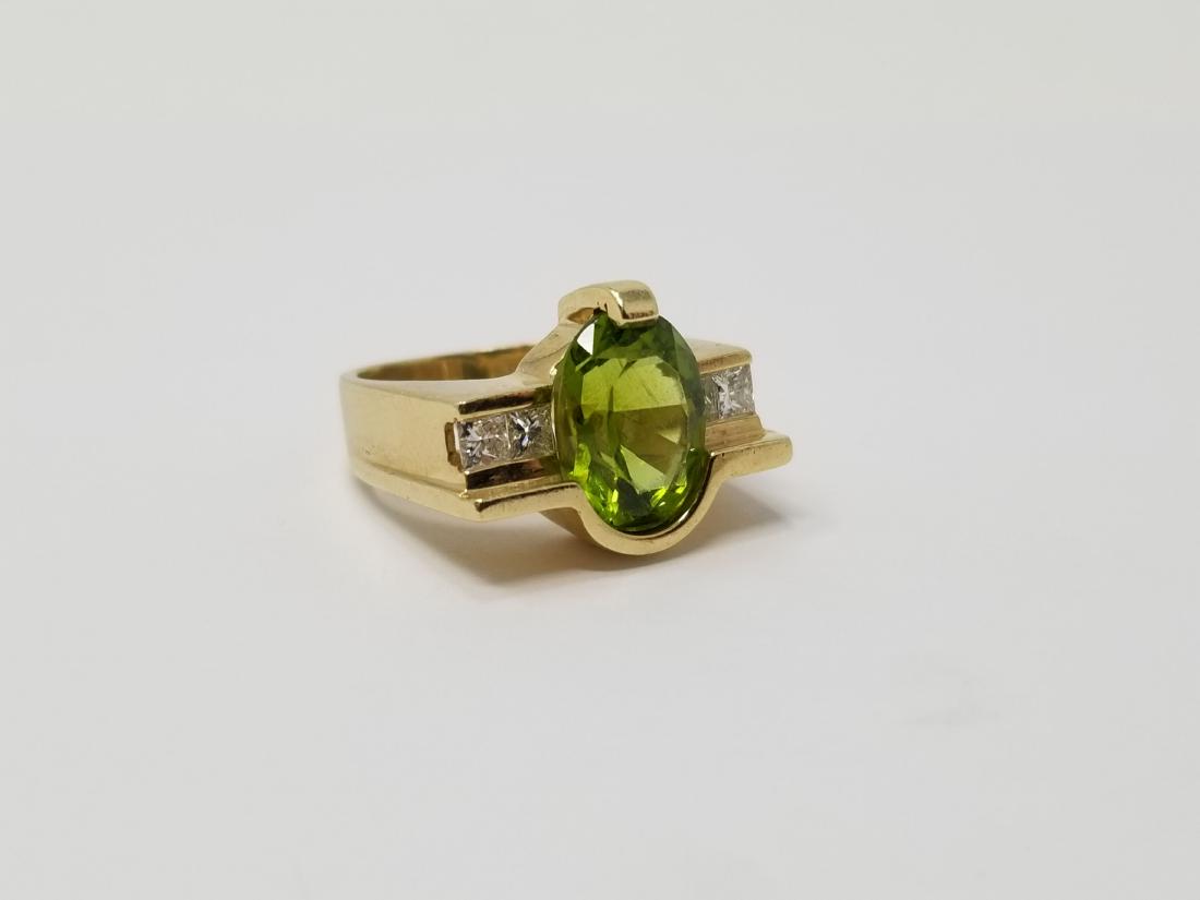 14K Gold Tourmaline & Diamond Ring: 14K Gold Tourmaline & Diamond Ring. Stamped 585 inside band. Ring Size: 5.25 Total Weight: 10.2 g - All silver, gold and/or jewelry lots or invoices containing said lots MUST be paid for via WIRE TRAN