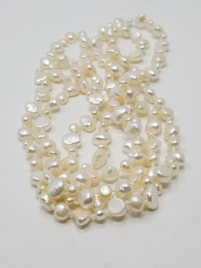 Strand of White Freshwater Pearls - 60 in.: Length: 60 in. Approx. Pearl Sizes: 4 - 8 mm