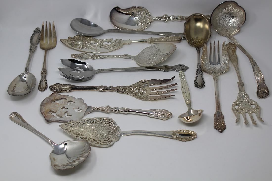 (16) Assorted Silver Plate Serving Utensils: (16) Assorted Silver Plate Serving Utensils.