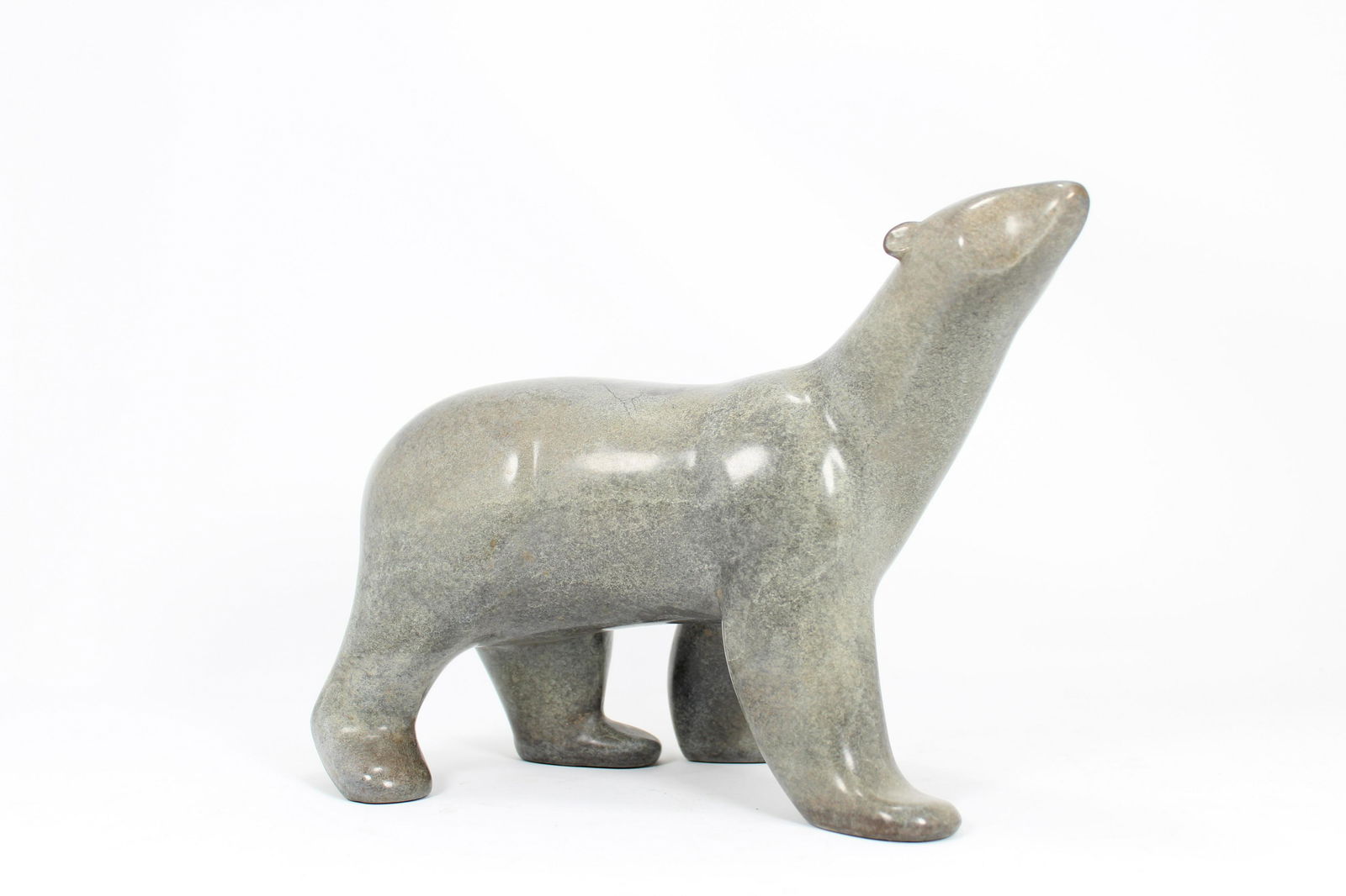 Loet Vanderveen (1921 - 2015) Large Polar Bear: Loet Vanderveen (1921 - 2015) "Large Polar Bear" Bronze. Signed and numbered (2/750) on bottom of figure. Comes with original certificate of authenticity. Size: 7.25 x 10.25 inches.