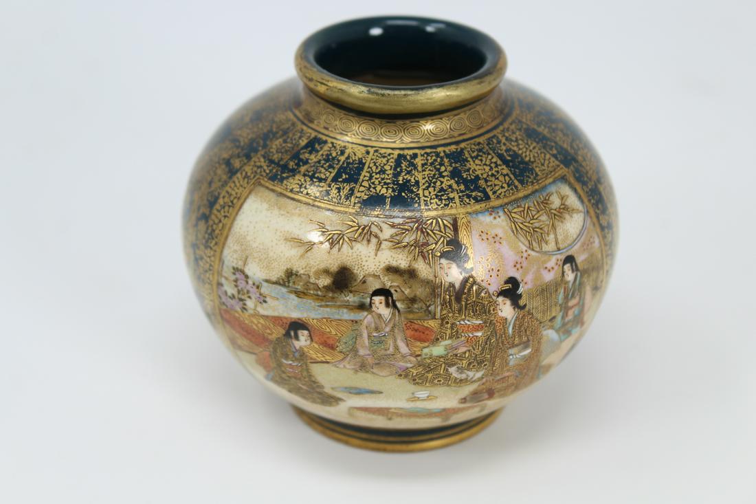 Antique Japanese Satsuma Bud Vase, Signed: Antique Japanese Satsuma Bud Vase, Signed . Meiji Period. Marked on bottom. Depicting hand-painted scenes of figures throughout exterior of vase. Height: 3 inches.