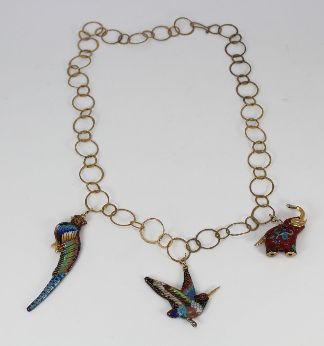 (3) Cloisonne Animal Pendants on Chain: (3) Cloisonne Animal Pendants on Chain. Depicting an elephant, hummingbird and peacock. Average Size: 2.5 x 3 in.