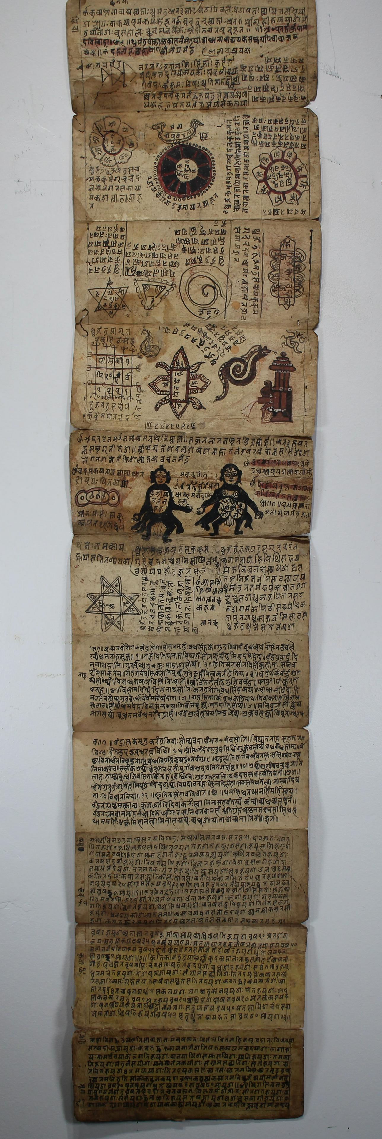 Early Illustrated Nepalese Divination Manuscript: Early Illustrated Nepalese Divination Manuscript. In Newari on yellow stained paper in various hands and formats. On 11 leaves of paper. Having writing/illustration on each side of manuscript. Unfolde