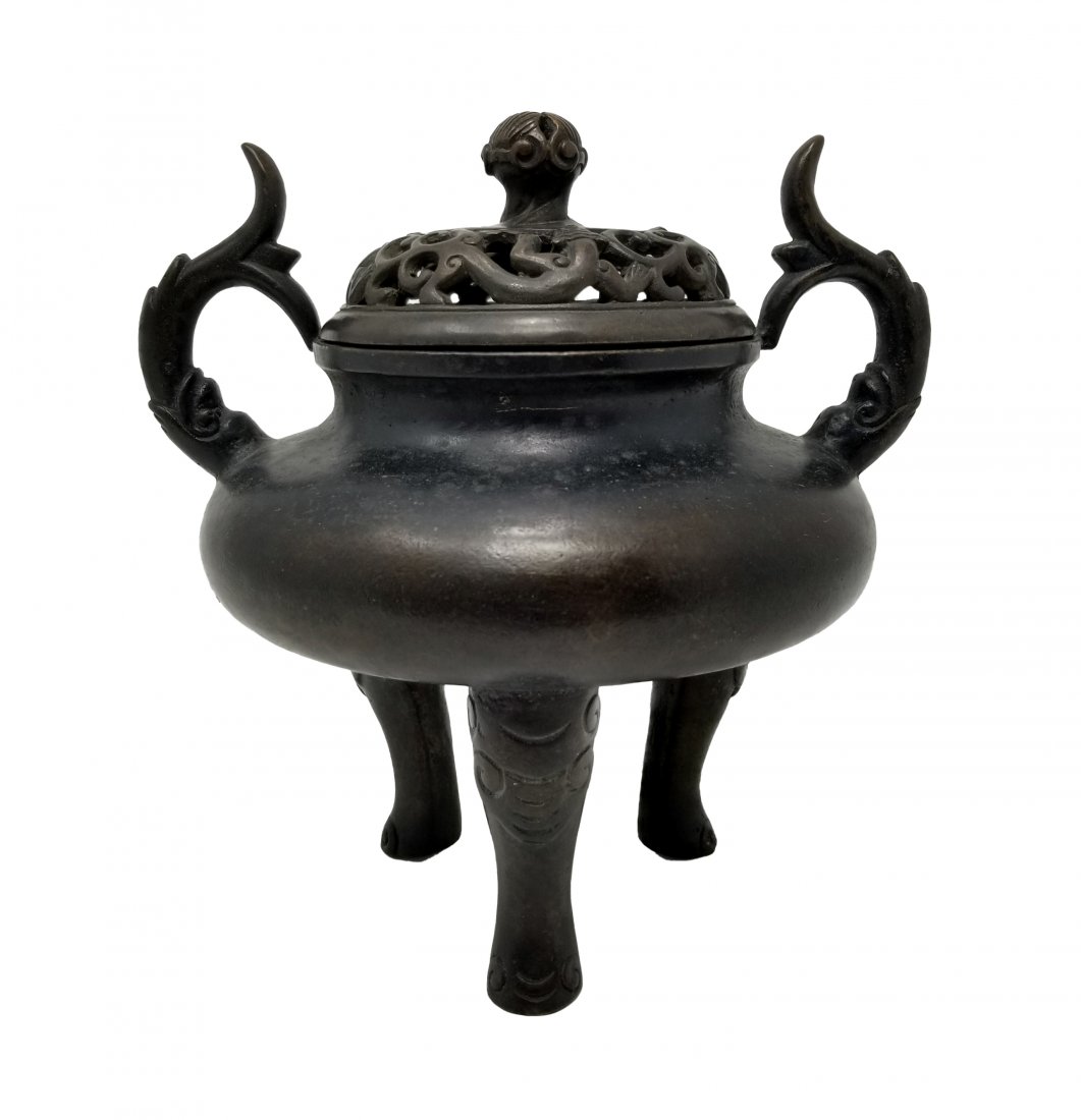 Signed, Chinese Bronze Tri-Footed Censer: Signed, Chinese Bronze Tri-Footed Censer. Having figural twin handles, reticulated lid. Signed on bottom. Size: 6.75 x 7 in.