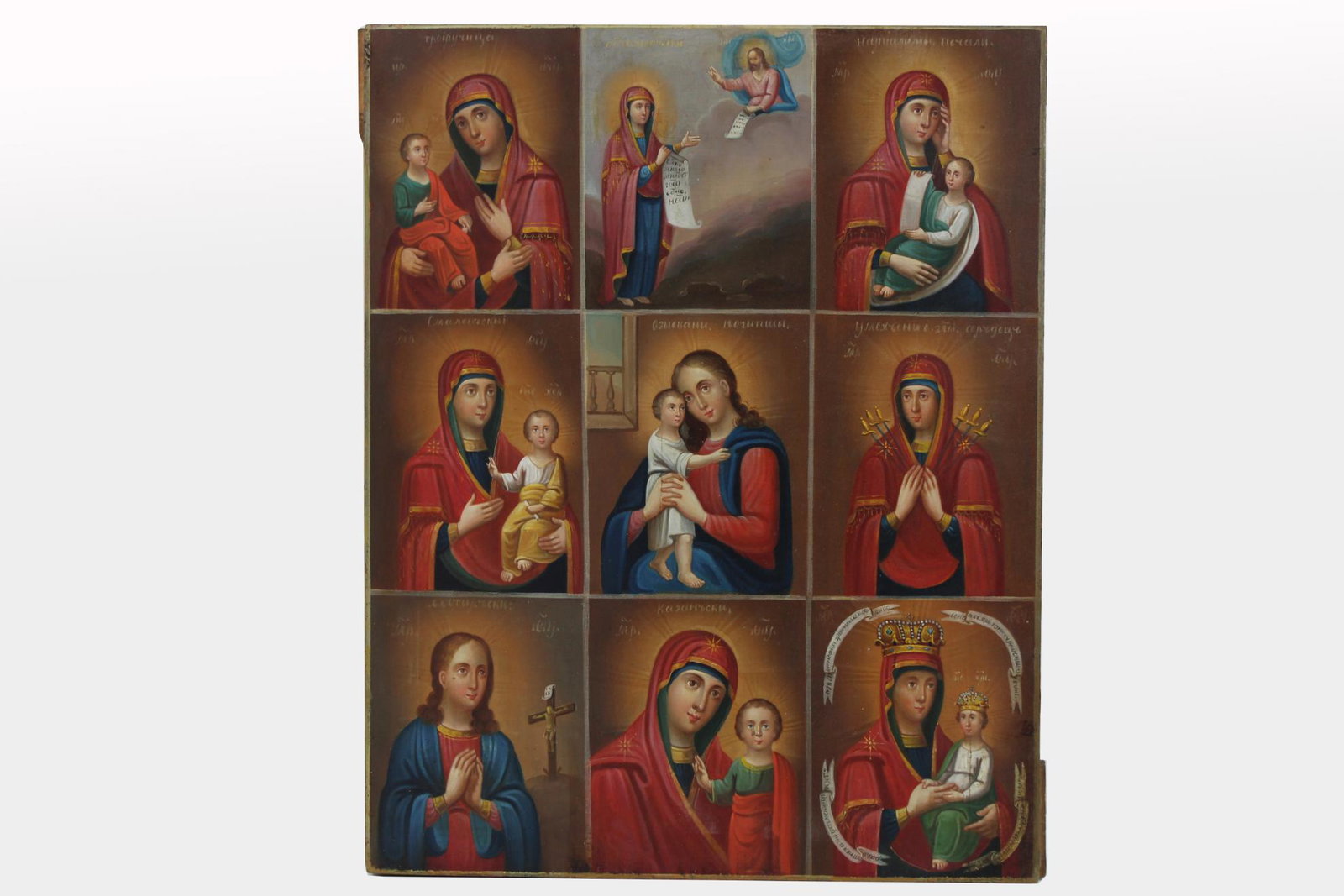 19th C. Russian Icon. 9 Images of Mother of God: Exhibited 19th C. Russian Icon depicting the 9 images of God. Oil on wood. Combination icons were very popular in the 19th century. Poor Russians saw these as an economical way to obtain holy images. 