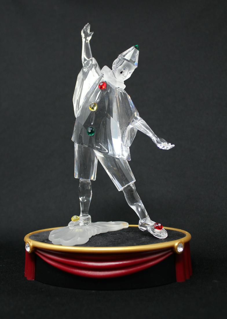 Swarovski Crystal Harlequin on Stand: Swarovski Crystal Harlequin on Stand. With original fitted case. Height including stand: 8.25 in.