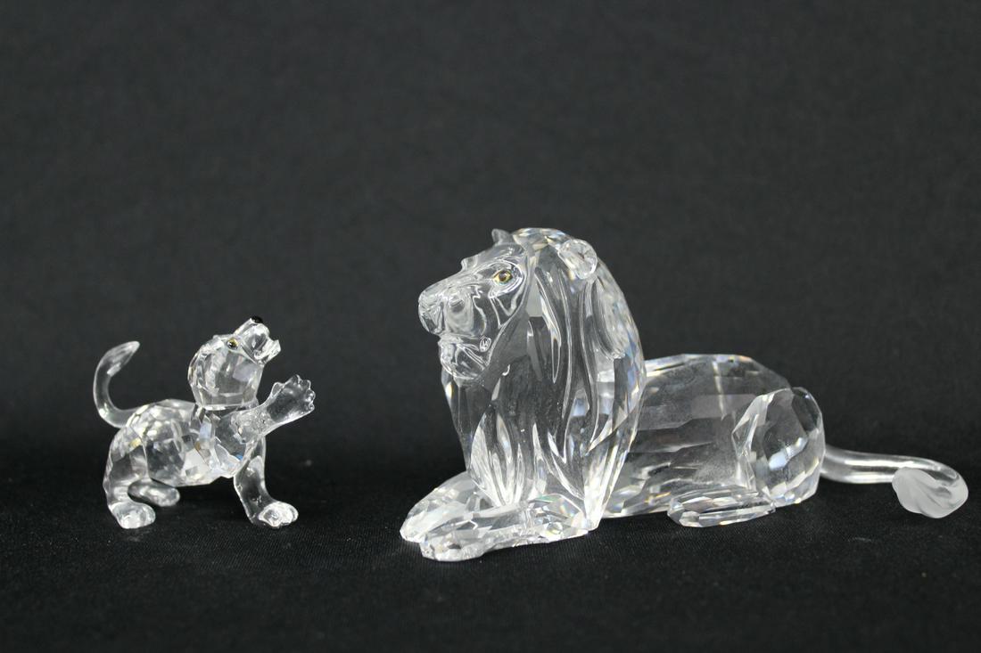 (2) Swarovski Crystal Lion Figures: (2) Swarovski Crystal Lion Figures.