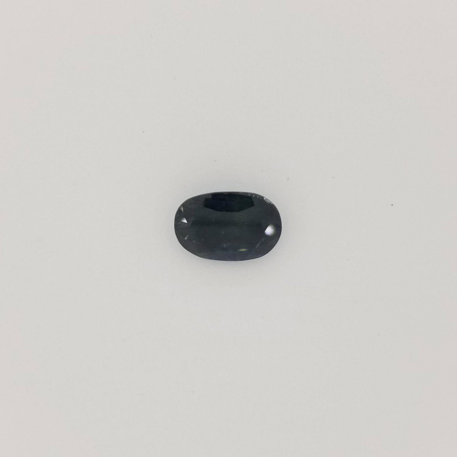 12.97 cts Sapphire: Dimensions: 16.93 x 12 x 6.44 mm