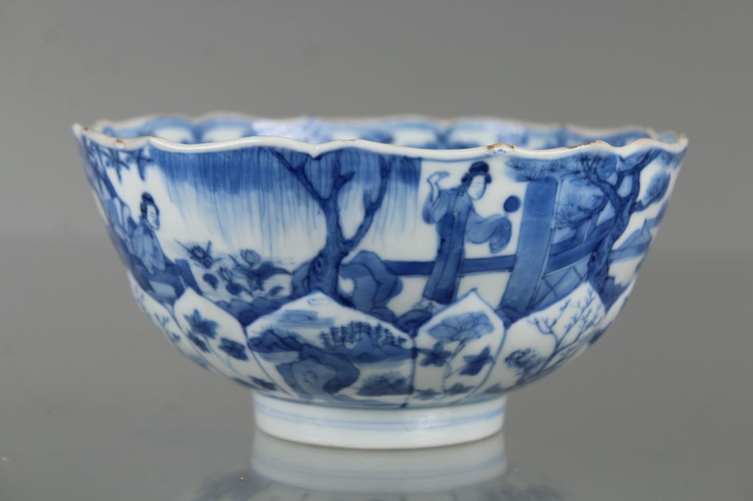 18th C. Chinese Blue/White Porcelain Bowl: 18th C. Chinese Blue/White Porcelain Bowl with hand painted elegant women in a courtyard landscape throughout exterior. Lotus flower motif near lower portion of the exterior. Interior of the bowl with