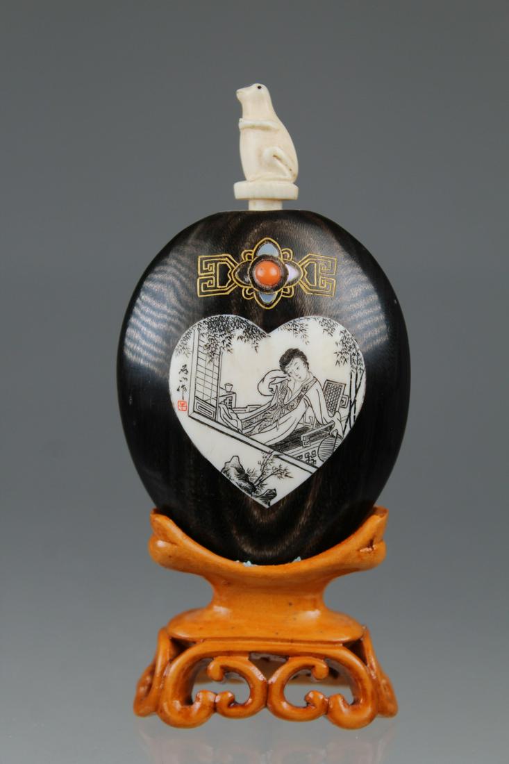 Signed, Inlaid Bone Snuff Bottle w/ Frog Stopper: Signed, Inlaid Chinese Bone Snuff Bottle with Carved Frog Stopper. Inscribed on backside of bottle. Total Height: 4 inches (Including Stand)