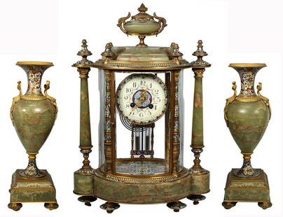 Important Tiffany & Co. Champleve 3 Pc Clock Set: Important Tiffany & Co. Champleve/Onyx 3 Piece Clock Set. "Tiffany & Co. New York" and "D'Argent Medaille" stamped on interior. With two champleve enameled onyx garnitures. Dimensions: 17 x 12 x 7 in.