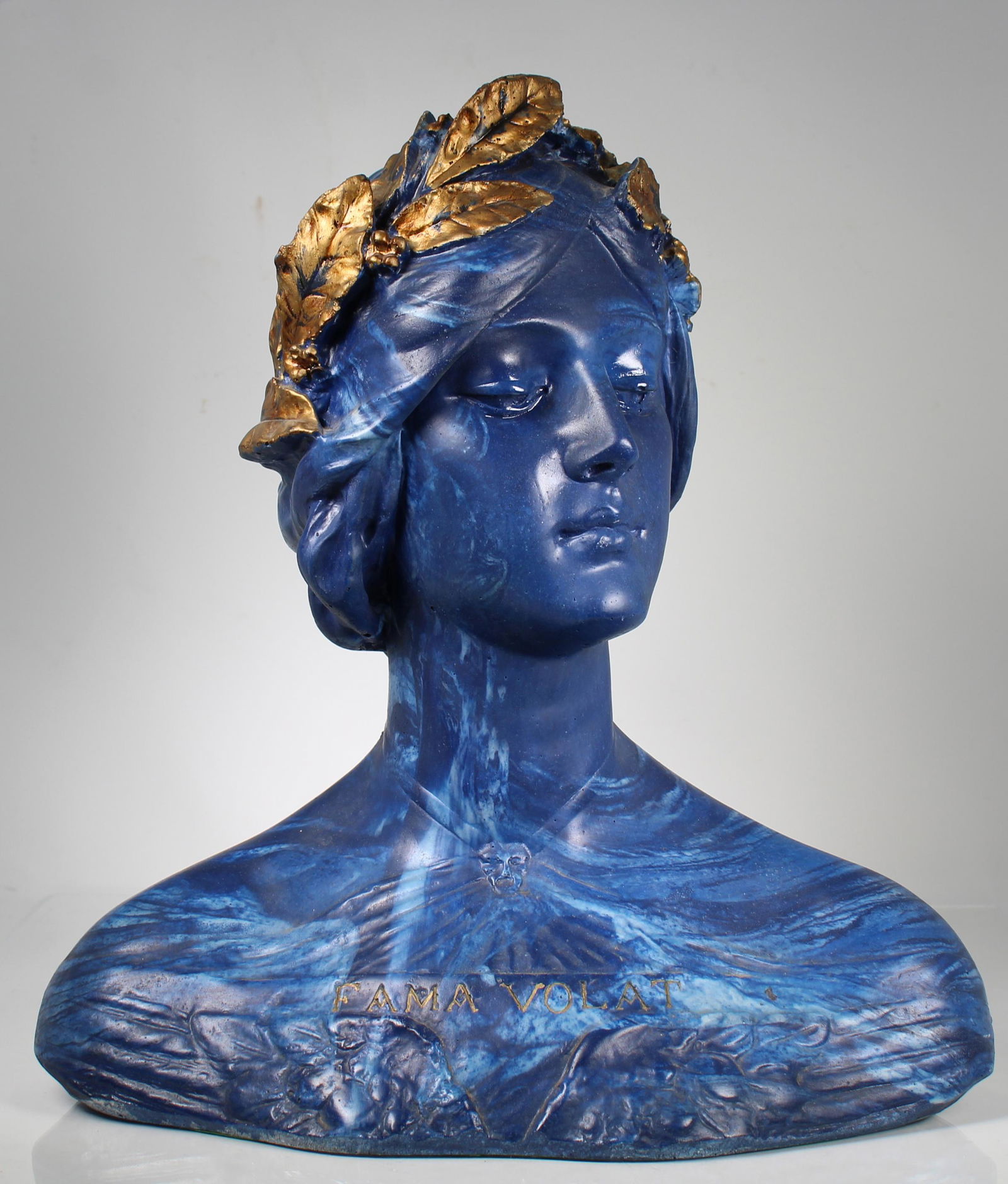 Italian Stone "Fama Volat" Bust: Italian Stone "Fama Volat" Bust. "Fama Volat" the Latin term for "Rumor has it..." engraved on the lower portion of the figure. Painted/Marbilized blue with gold leaf. Height: 15 in.
