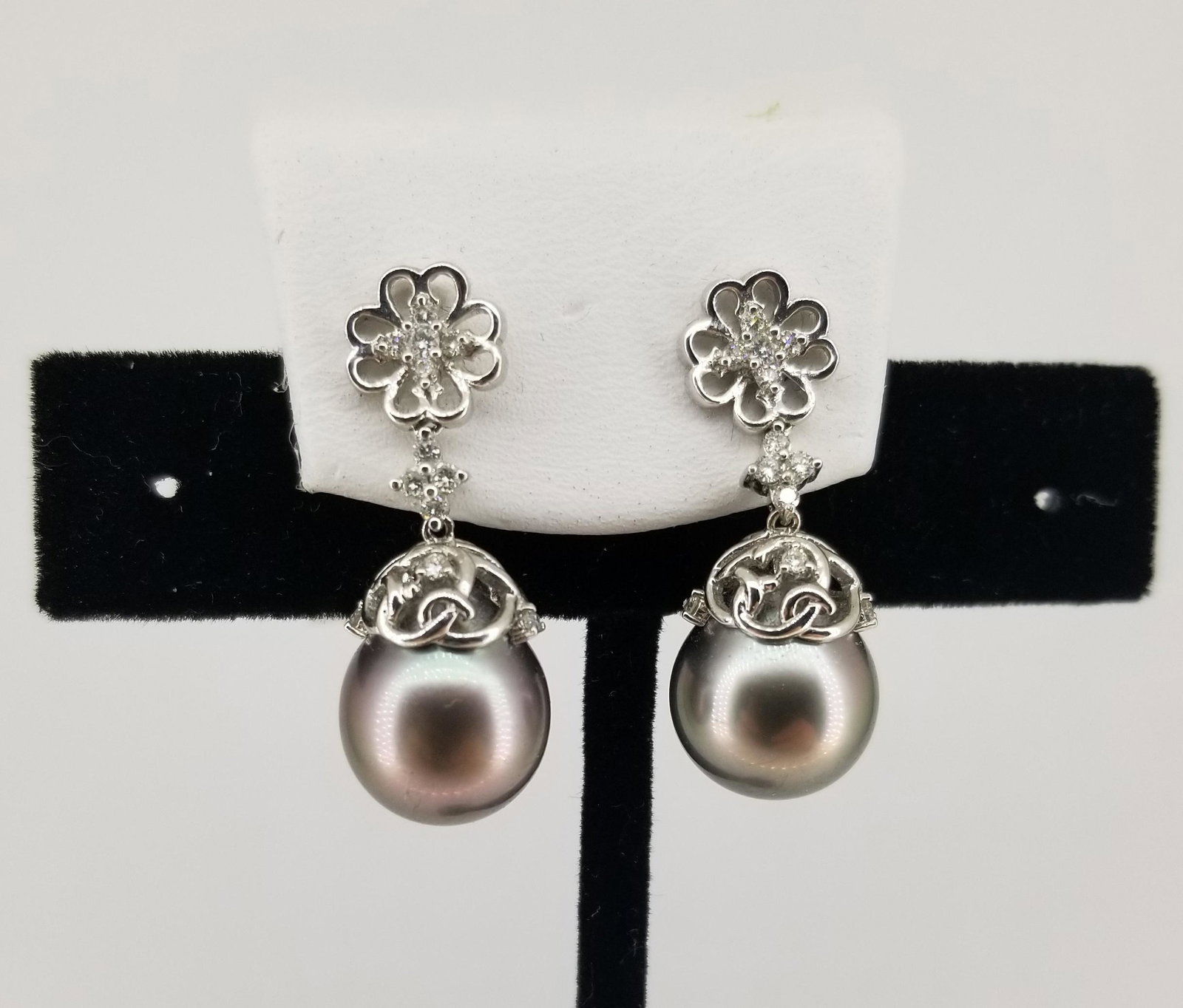 18K Tahitian Pearl & Diamond Earrings: 18K Tahitian Pearl & Diamond Earrings. Weight: 7.8 g Approx Total Diamond Weight: 0.85 ctw Approx Pearl Size: 11.5 mm - All silver, gold and/or jewelry lots or invoices containing said lots MUST be pa