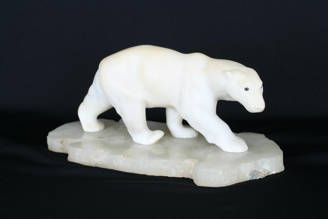 Carved Polar Bear on Rock Base: Carved Polar Bear on Rock Base. 20th century. Dimensions: 5.25 x 13 x 6 in.